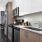 a kitchen with white cabinets