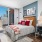 a bedroom with a large window