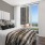 a bedroom with a large window